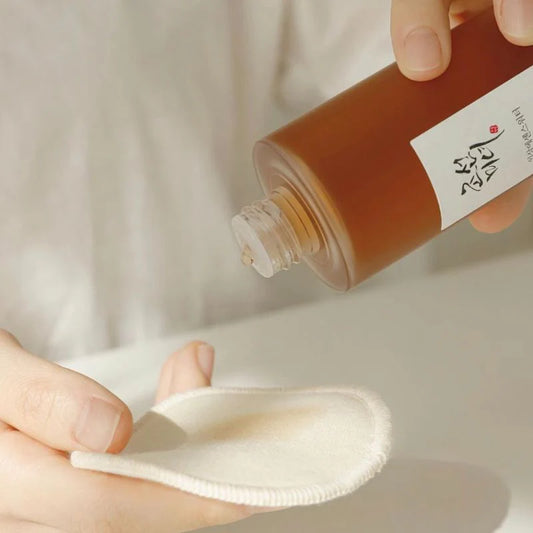 Botella de la esencia con 80% agua de raíz de ginseng.